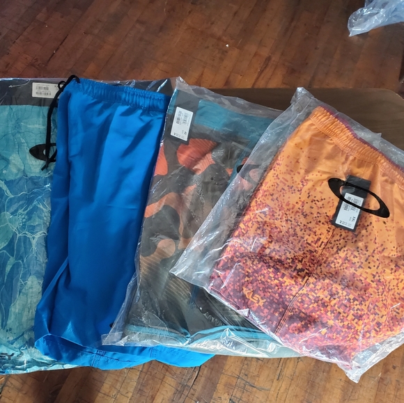 4 pack Oakley board shorts / swimsuit NWT XXL sz. 40.